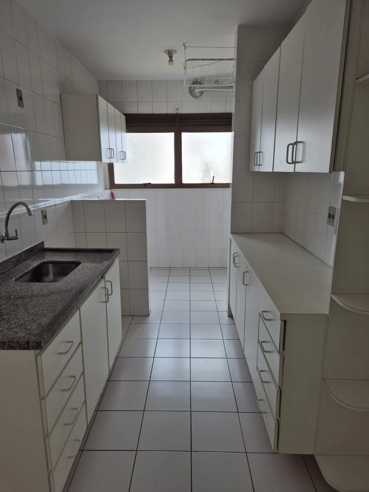 APARTAMENTO EM CONDOMÍNIO